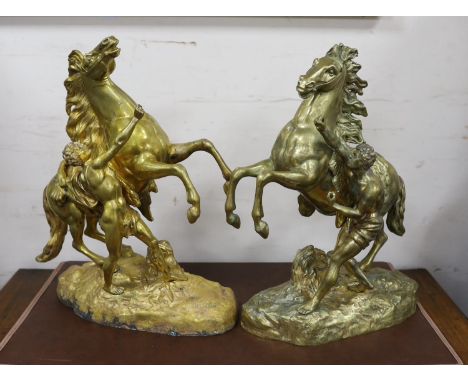 A pair of bronze Marly horses after Cousteau