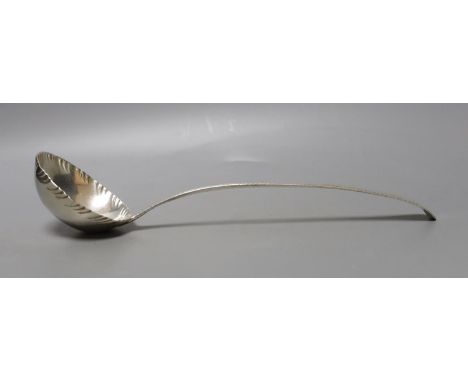 A George III silver Old English pattern feather edge soup ladle, John Lampfert, London, 1771, 32.2cm, 126 grams.