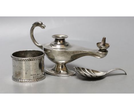 A George V silver 'Aladdin's Lamp' lighter (lacking cover), length 12cm, a silver napkin ring and a William IV silver caddy s