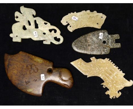 A group of five Chinese jade or hardstone archaistic carvings