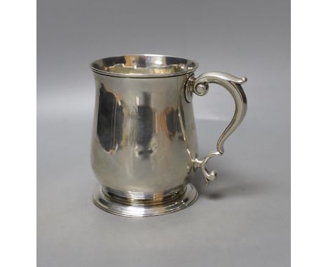 A George II silver baluster mug, Shaw &amp; Priest, London, 175, 11.5cm, 10.5oz (a.f.).