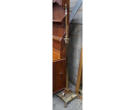 An Edwardian brass telescopic standard lamp