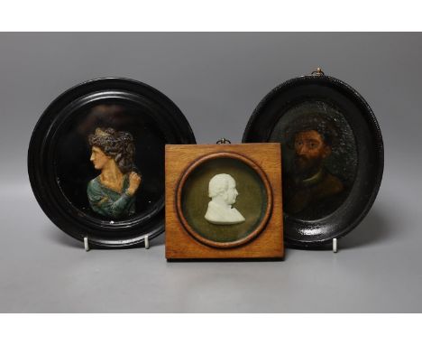 Two framed carved wax portrait busts and an oval miniature