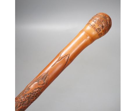 A Japanese carved bamboo walking stick, 89cm