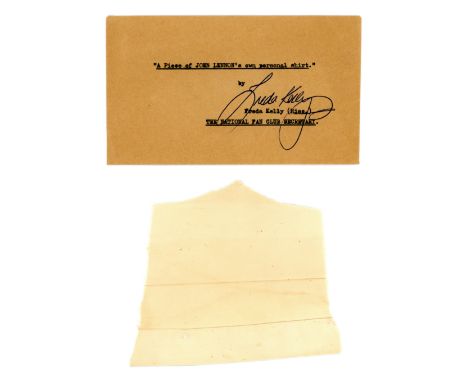 An envelope signed by The Beatles Fan Club secretary Freda Kelly in blue ballpoint pen. Printed on the envelope are the words