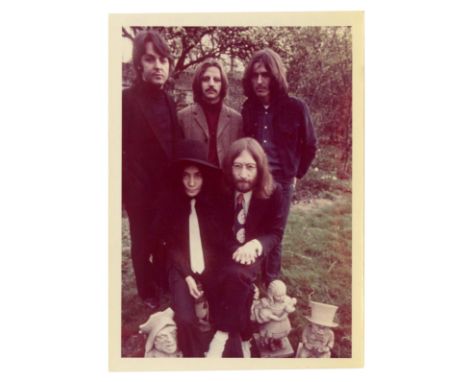 An original sixties colour photograph of The Beatles and Yoko Ono taken by Linda McCartney on the 30th April 1969. The sessio