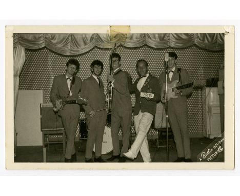 An original sixties black and white photograph of Rory Storm and The Hurricanes, including Ringo Starr, taken at a Butlins Ho