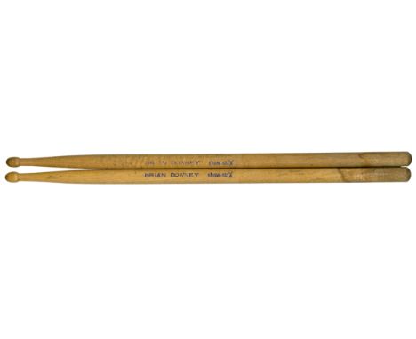 A pair of drum sticks previously belonging to Brian Downey, drummer of Thin Lizzy. They were obtained after a concert at the 