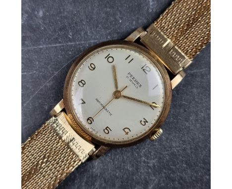 An early 1960s Peerex 9ct gold antimagnetic manual wind wristwatch, 33mm, on gold plated Milanese bracelet.
