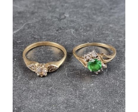 A gemstone set ring, stamped 14k, size P; and another set CZs, stamped 14k, size Q, gross weight 5.3g. (2)
