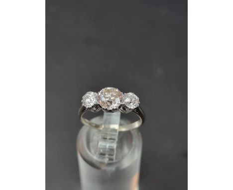 A brilliant cut diamond three stone ring, with a total diamond weight of approximately 1.5ct, size M.