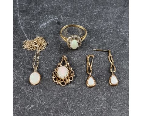 A yellow metal opal and diamond ring; together with an opal pendant, stamped 375; an opal pendant, on fine chain stamped 375;