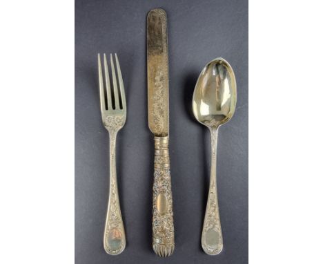 A Victorian silver gilt child's knife, fork and spoon set, by&nbsp;Holland, Son &amp; Slater, London 1881/2, 69g weighable.