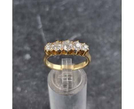 A diamond five stone ring, of approximately 1ct in total, size T.