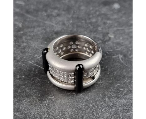 A Pallavicini ring, set black agate and pave diamonds, stamped 750, size N.