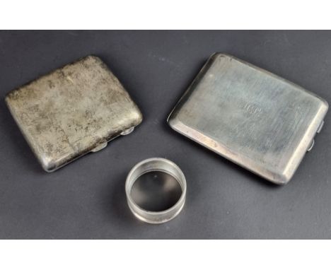 A silver cigarette case, by&nbsp;S W Goode &amp; Co, Chester 1923, 10.5cm wide; together with another silver cigarette case; 