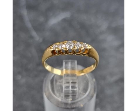 An Edwardian 18ct gold diamond five stone ring, London 1908, size O, gross weight 2.9g