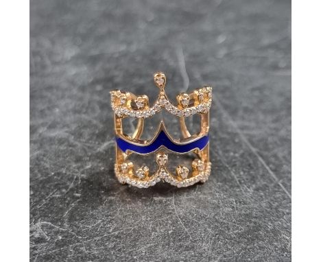 A yellow metal, blue enamel and diamond set ring, signed Noupar and 750, size D 1/2, boxed. All proceeds to the Aldingbourne 