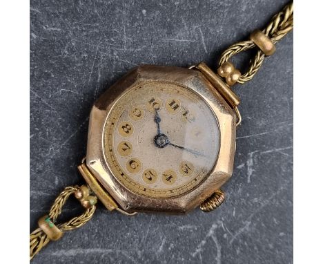 An Art Deco 9ct gold manual wind ladies wristwatch, 25.5mm, Ref. 4036, on original plated bracelet.