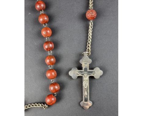 A vintage French rosary bead necklace, with attached crucifix,