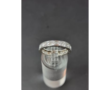 A diamond set half eternity ring, size N.