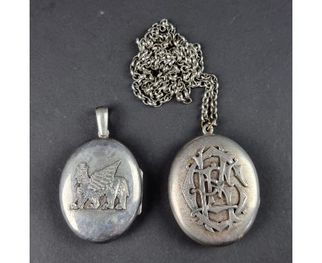 Two vintage white metal lockets, one decorated with initials and the other with a winged lion, 49 and 44mm respectively.
