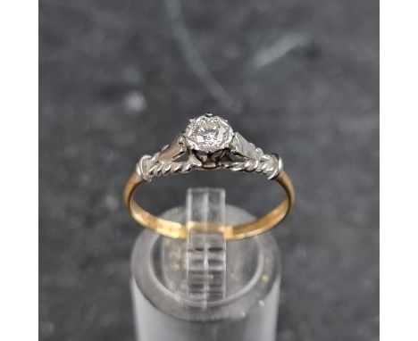 An 18ct gold diamond illusion ring, set brilliant cut stone of approximately 0.20ct, London 1960, size R, gross weight 2.4g.