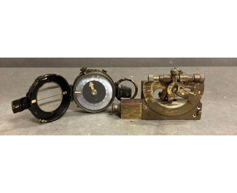 A miniature vintage sexton and a vintage compass 