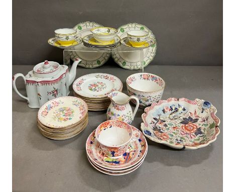 A mixed selection of porcelain tea cups, saucers and plates, various makers 