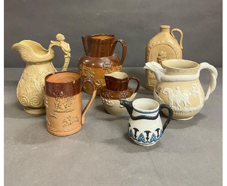 A selection of stoneware jugs and mug, one stamped Bailey and Co Fulham along with a Staffordshire Jasperware jug, light beig