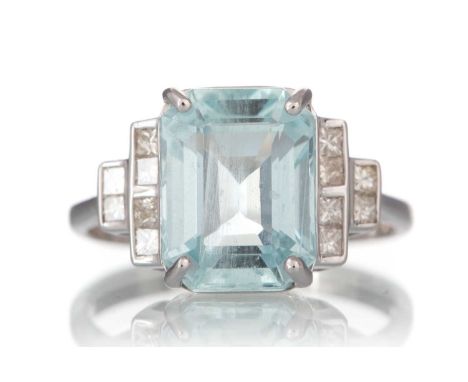 AQUAMARINE AND DIAMOND RING, the step cut aquamarine of approximately 3.68 carats, flanked by princess cut diamonds totalling