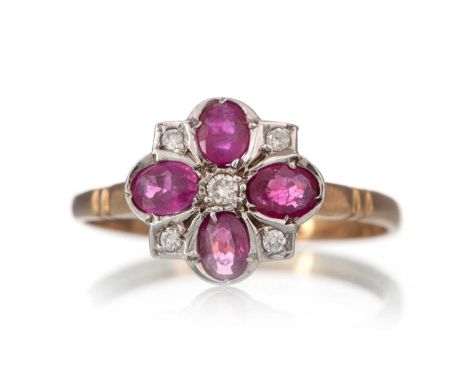 RUBY AND DIAMOND RING, in the form of a flower cluster, in nine carat gold, size N 1/2Qty: 1.8g