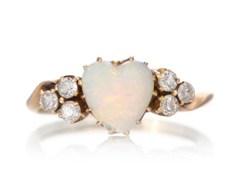 OPAL AND DIAMOND RING, set with a heart shaped opal flanked by three diamonds on each shoulder, in eighteen carat gold, size 