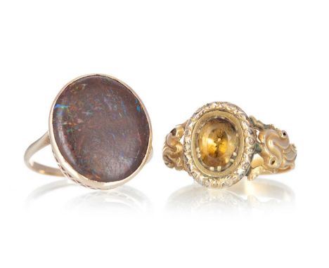 GEORGIAN PASTE RING, ALONG WITH ANOTHER, the Georgian ring set with a yellow paste stone to an ornate shank, the other modern