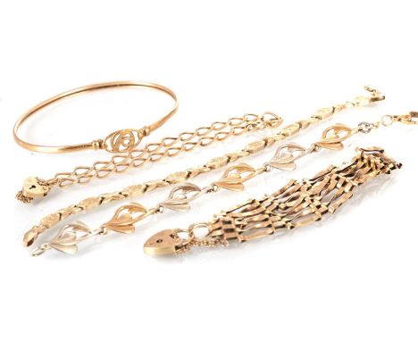 COLLECTION OF GOLD BRACELETS, including a gate bracelet and three others, along with a bangle, each marked for nine carat gol