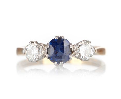 SAPPHIRE AND DIAMOND THREE STONE RING, set with a central sapphire flanked by diamonds totalling approximately 0.40 carats, m