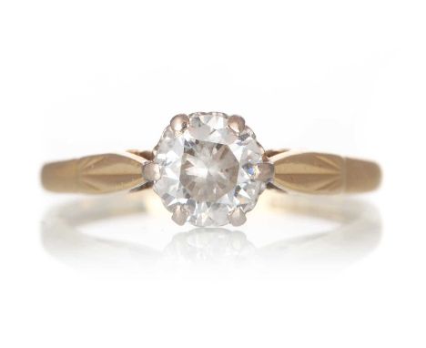 DIAMOND SOLITAIRE RING, set with a round brilliant cut diamond of approximately 0.75 carats, in eighteen carat gold, size MQt