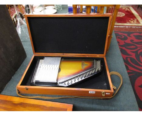 Boxed musical harp