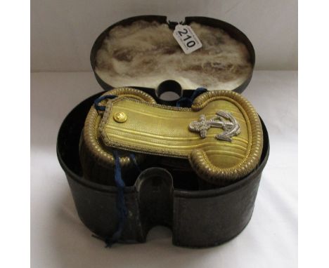 Royal Navy epaulettes and sword tassles, early 19C by Batten &amp; Adams in original tin - Est £200 to £300
The tassels are f