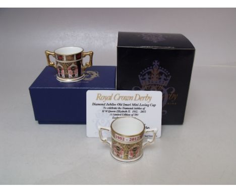 A LIMITED EDITION  ROYAL CROWN DERBY DIAMOND JUBILEE OLD IMARI MINIATURE LOVING CUP, number 209 of 500, boxed with certificat