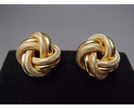 A PAIR OF 14K GOLD CLIP ON EARRINGS, in the form of a knot, marked to clip 14K, MILOR, Italy, approx 11 g, together with a vi