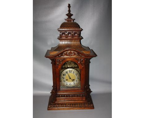 A LARGE AND IMPRESSIVE LATE 19/EARLY 20TH CENTURY WALNUT MANTEL CLOCK BY GUSTAV BECKER, the well carved case with scrolling f