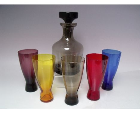A STUDIO GLASS DECANTER WITH FIVE SHAPED HARLEQUIN TUMBLERS, together with a selection of studio glass drinking glasses