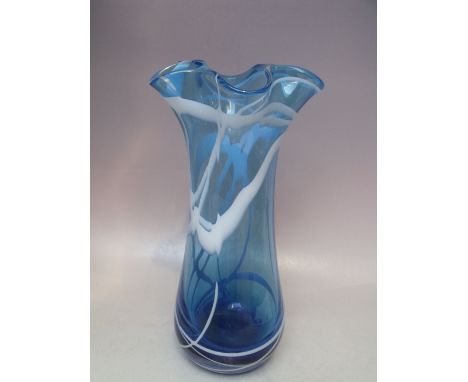 A VINTAGE STUDIO / ART GLASS VASE WITH SIGNATURE TO BASE, blue cased body with white swirled decoration, flared wavy rim, H 3