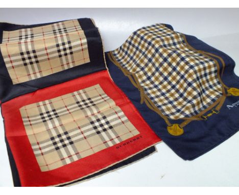 A VINTAGE BURBERRY SCARF, 46 x 46 cm, together with an Aquascutum scarf, 146 x 25 cm (2)