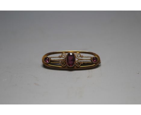 A VINTAGE GOLD AMETHYST BROOCH, approx weight 2.4g, W 3.5 cm