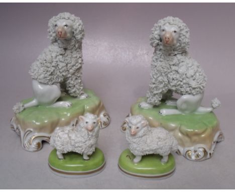 A PAIR OF DRESDEN CERAMIC DOG FIGURES, together with a smaller pair of Dresden sheep figures, tallest H 13 cm (4)