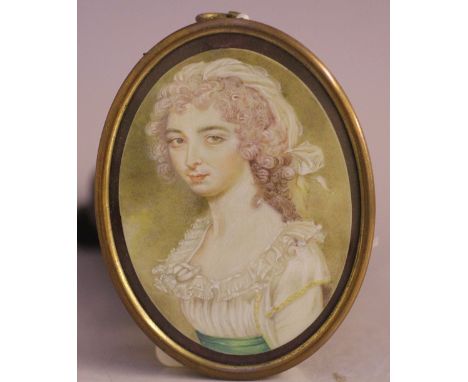 (XIX). Oval portrait miniature of a young lady in a white dress, unsigned, framed and glazed, 8 x 6 cm