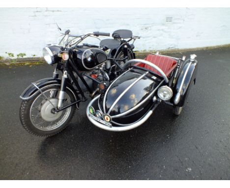 A 1959 BMW R60 HISTORIC MOTORCYCLE WITH STEIB SIDECAR AND HARD CASED PANNIERS 'MFF 730', having black painted coachwork and p