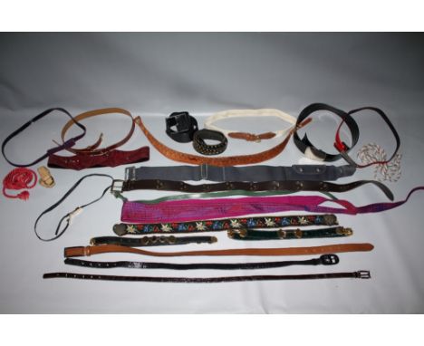 A COLLECTION OF VINTAGE AND FASHION BELTS, various styles and periods, to include fabric and leather examples and a vintage e
